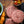Raw beef burger patties with a yellow chilli and a herb sauce